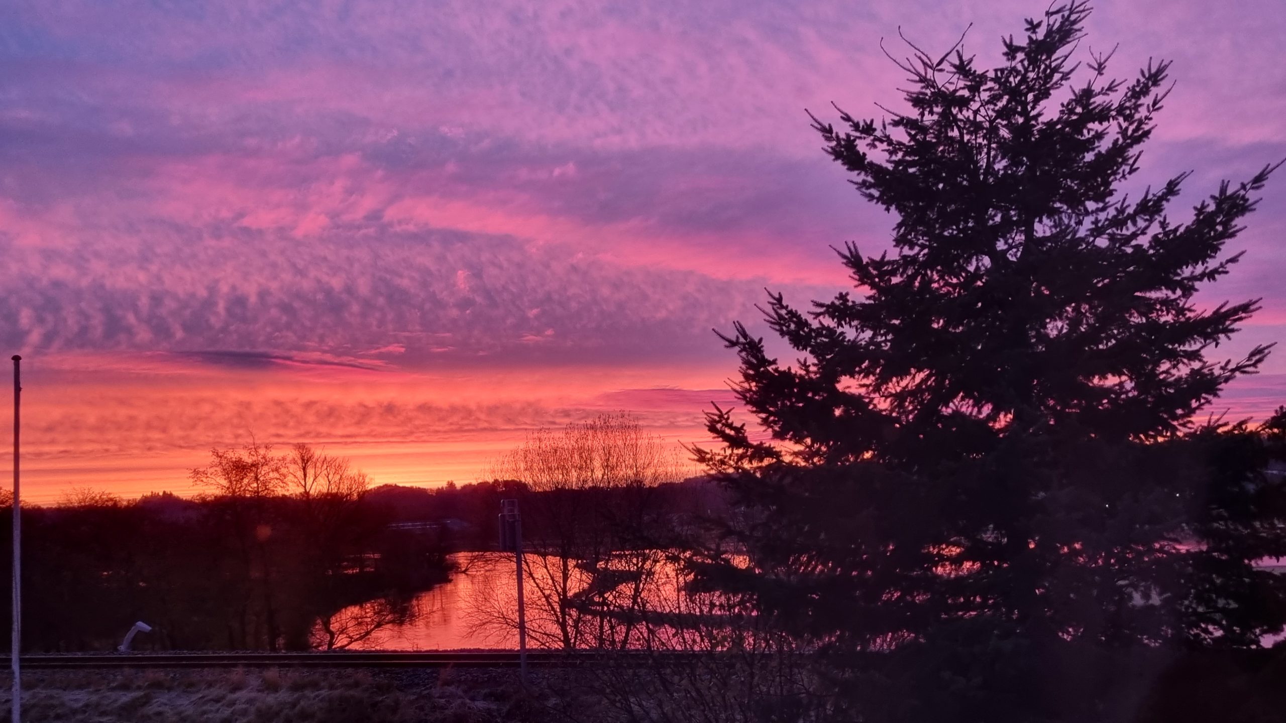 Solopgang over Gudenåen